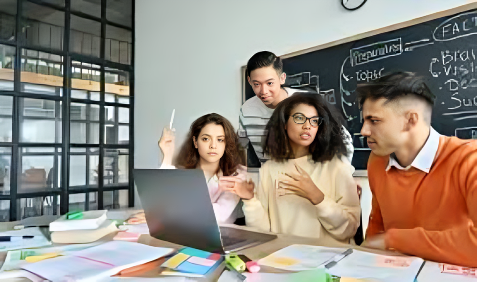 Group of students understanding a concept, explaining (teaching) each other to clear the doubts of each student.